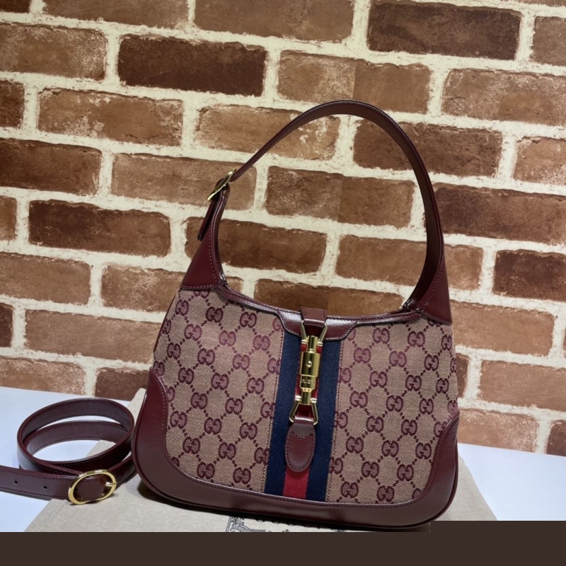G*u*i top handle bags